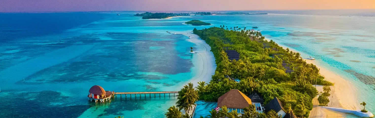 The iconic Sun Island in the Maldives, a pristine beach destination known for its crystal-clear waters and white-sand beaches.