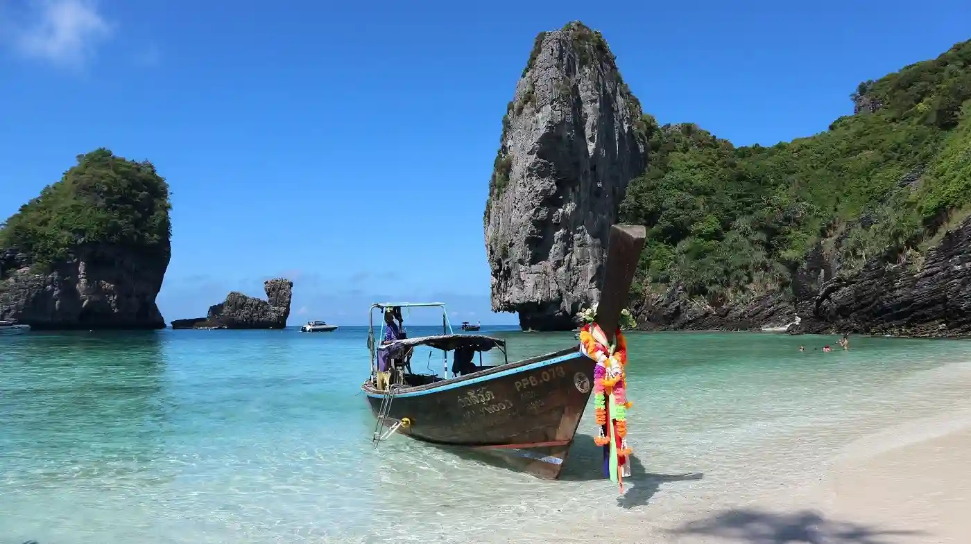 Thailand's vibrant culture and stunning beaches, featuring iconic attractions like the Grand Palace and Phi Phi Island.